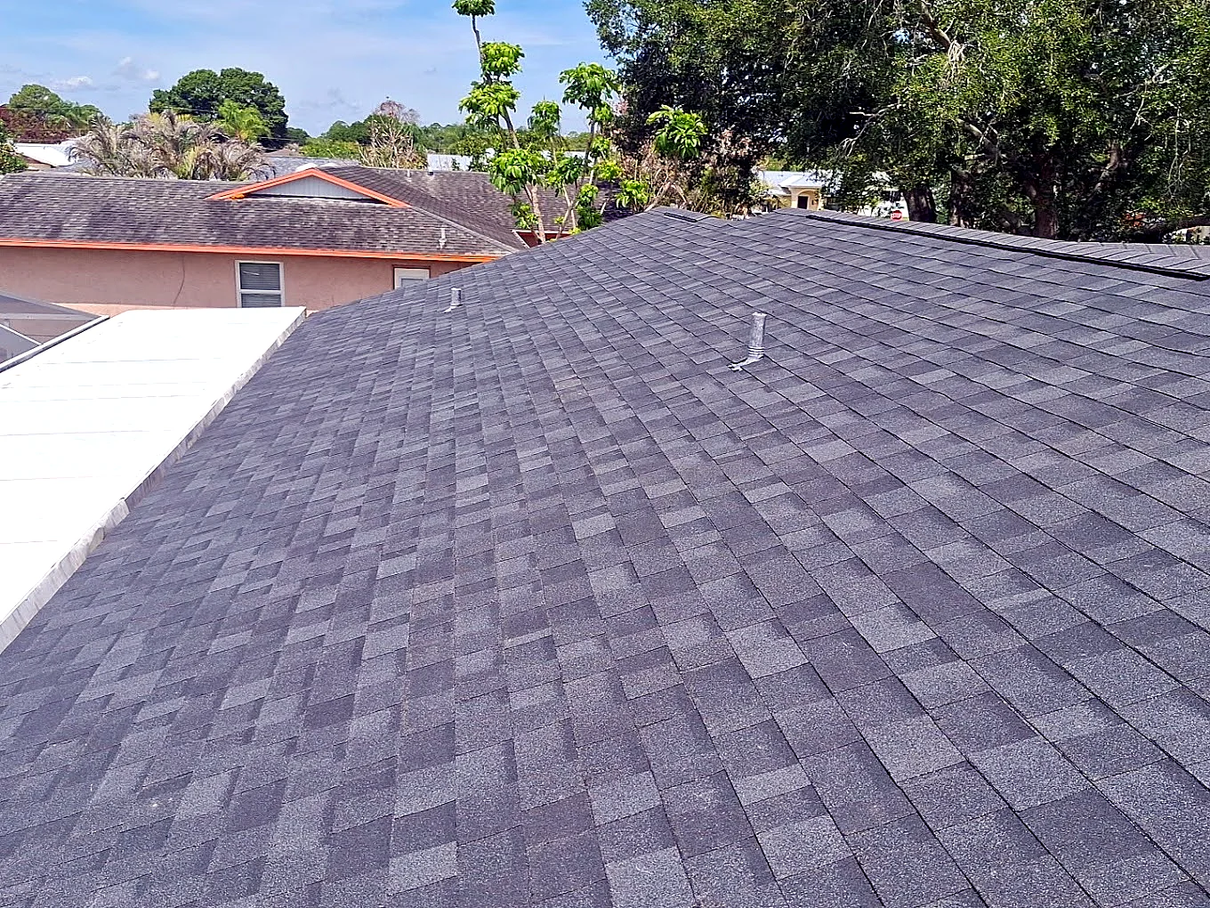 Gray shingle roof closeup by Stormproof Roofing, Inc