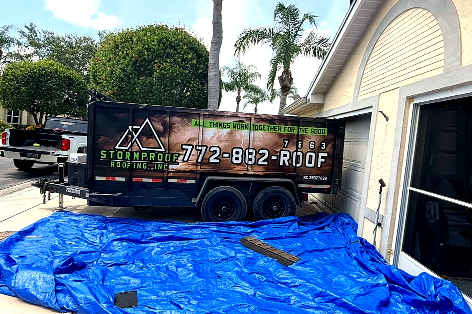 Stormproof Roofing, Inc roof repair tarp protection jobsite