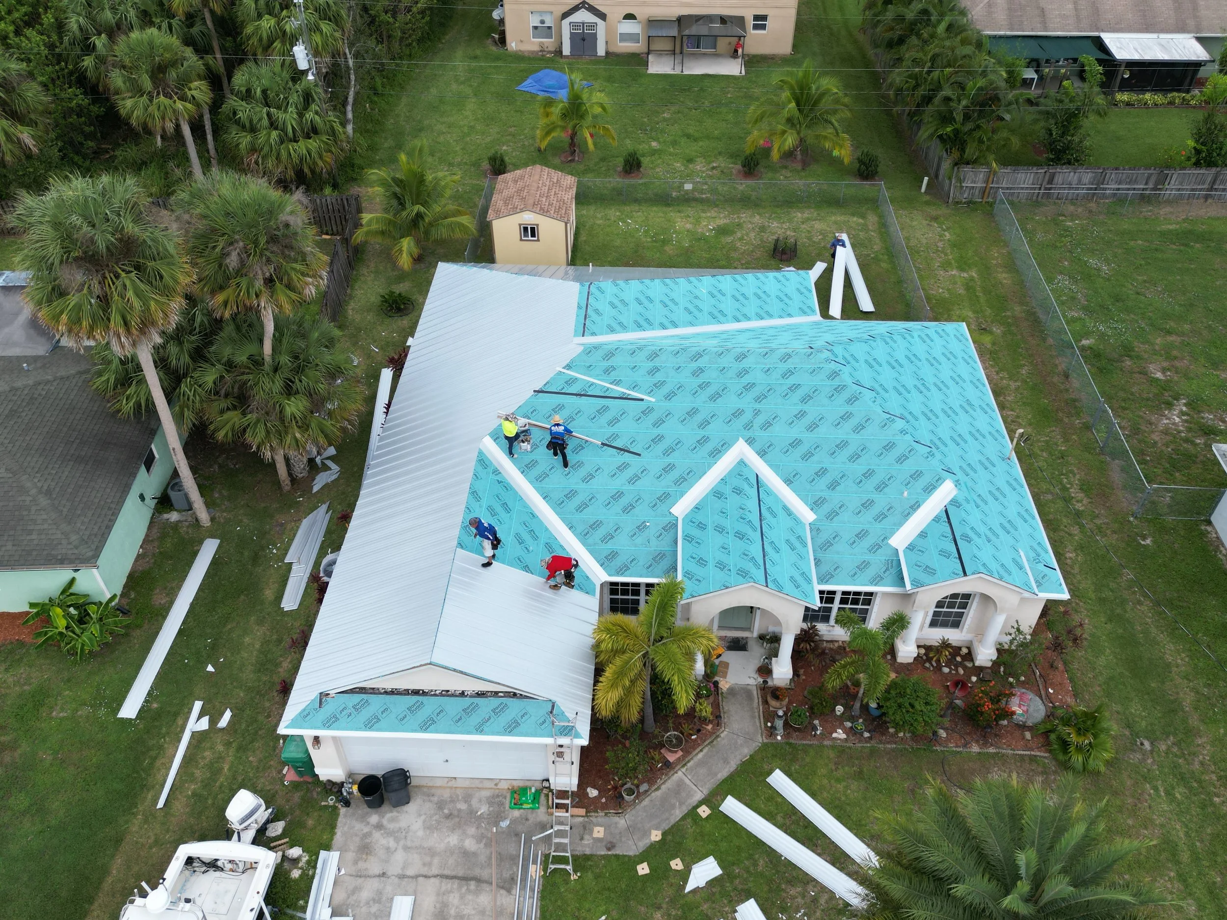 Metal roof installation aerial project by Stormproof Roofing, Inc