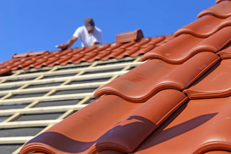 Tile roof inspection and roofing work by Stormproof Roofing, Inc
